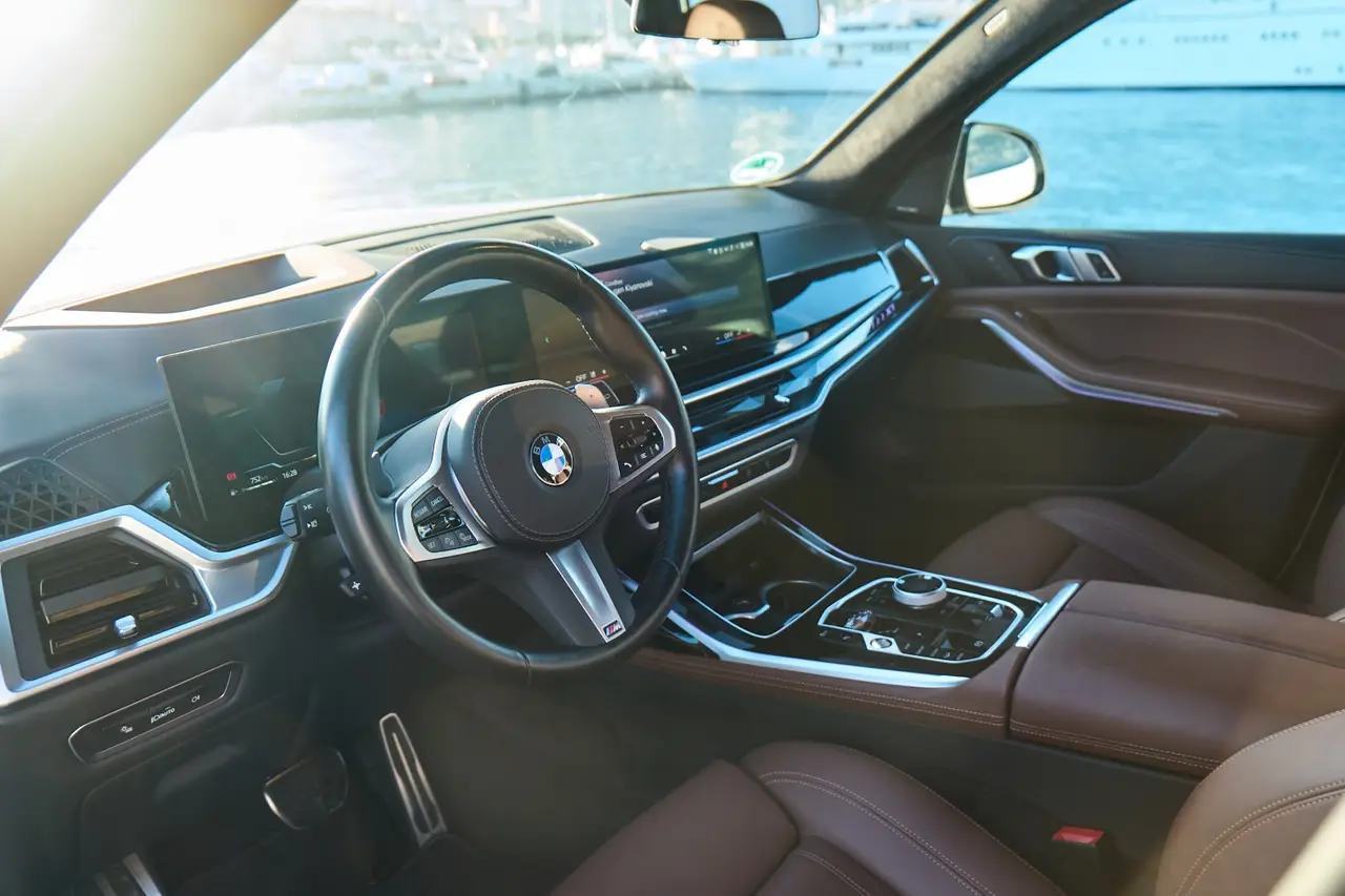 BMW X7 40d M 2024, interior — Nice Super Car Rental, Nice. Seven seats, three corniches, one commanding view